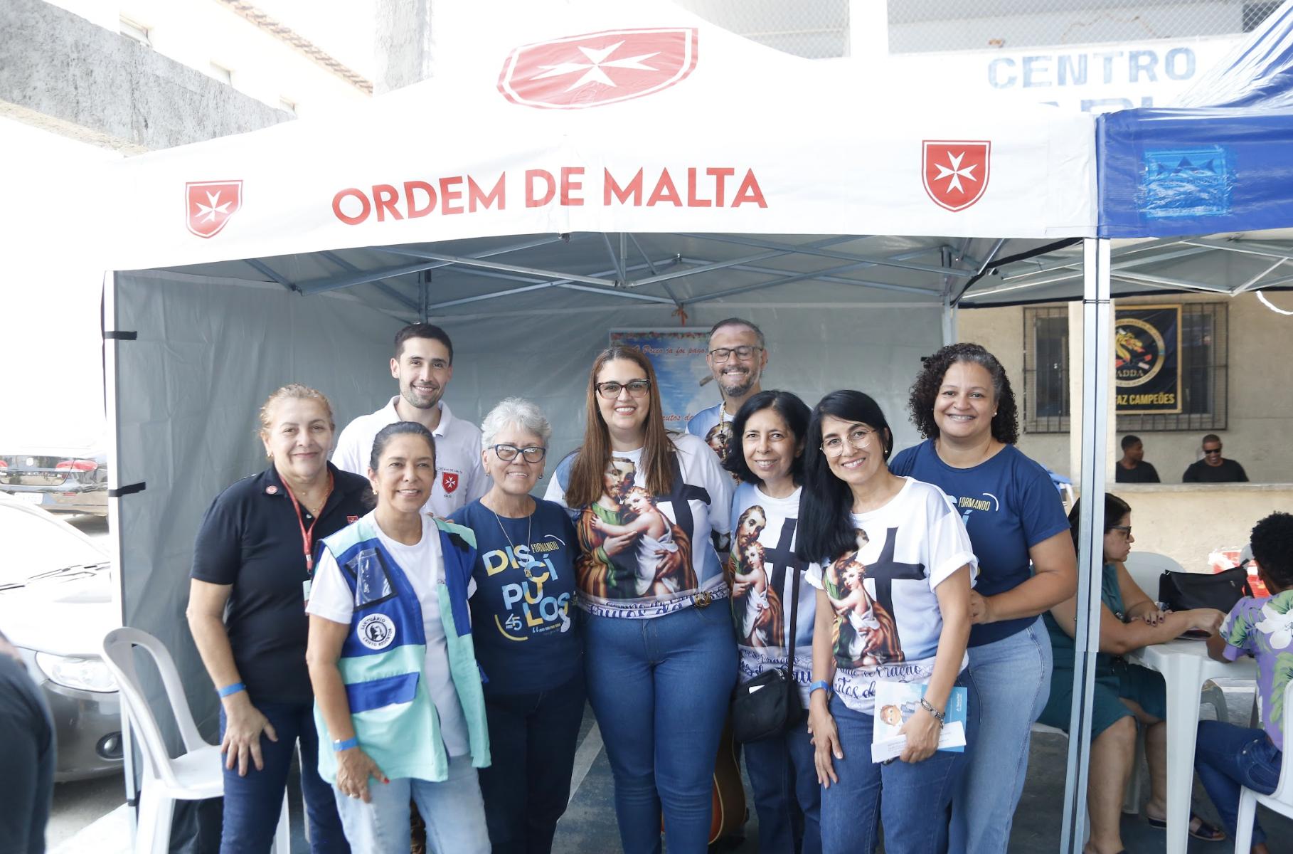 Equipe e participantes de uma edi&ccedil;&atilde;o da A&ccedil;&atilde;o de Amor